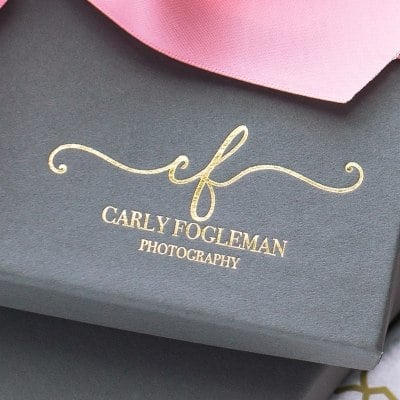 Gray photography packaging with gold foil imprinted studio logo for Carly Fogleman Photography