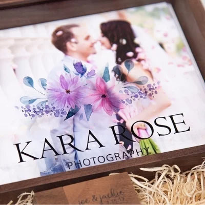 Full color printed photography box lid featuring Kara Rose Photography studio logo with floral watercolor design and wedding couple portrait