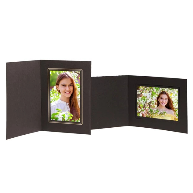 Black Cal Folder open with two portrait photos, showing side-loading linen finish design in multiple sizes