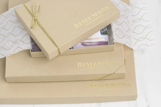 Tyndell Stribbons wrapped around portrait boxes showing stretchy elastic band closure with pre-tied bow