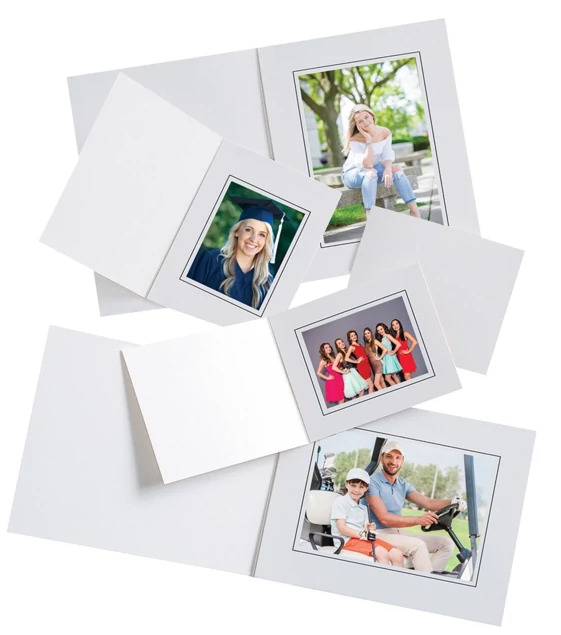 White Event Folders in multiple sizes showing glossy white finish with black border detail and bottom-loading design