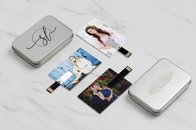 White credit card flash drive and aluminum metal tin bundle showing custom full-color printed drive and tin