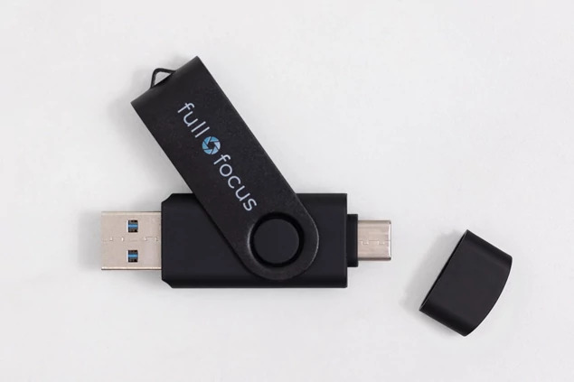 Black dual swivel flash drive showing USB-A 3.0 connector extended with full color printed branding