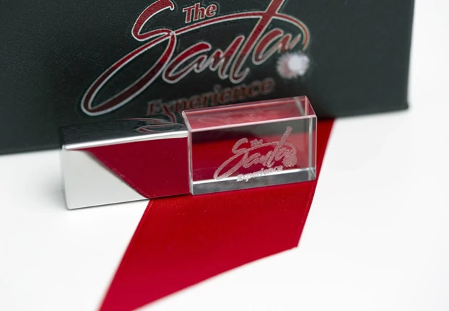 Silver Crystal Flash Drive with laser engraved studio logo showing customization option on crystal drive