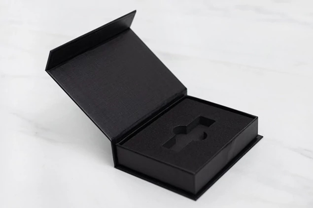 Black Magnetic USB Gift Box open with Crystal Flash Drive in foam insert showing secure fit