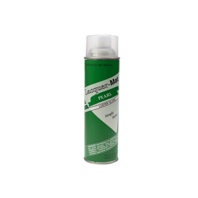 Pearl lacquer aerosol spray can in green label showing luster semi-gloss finish for high key photography protection