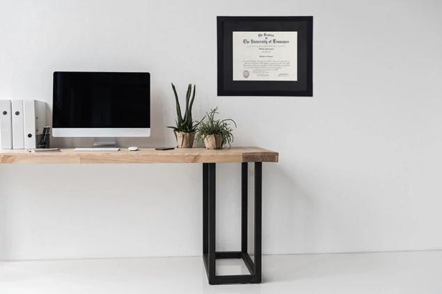 Black wood diploma frames in 12x14.5 and 16x19 sizes showing clean molding and acrylic front