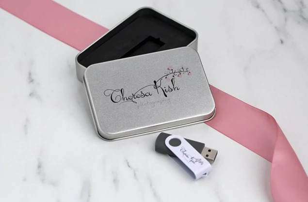 Tyndell USB Swivel Drive and Metal Tin Bundle open showing aluminum tin with foam insert for flash drive delivery