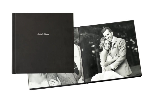 Perry Album open showing repositionable adhesive pages with double sided layout for easy photo placement