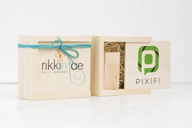 Rustic wood flash drive box open showing natural wood filling and slide top design