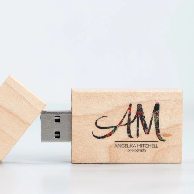Tyndell Maple Wood Flash Drive with laser engraved studio logo on one side showing 20 character per line customization