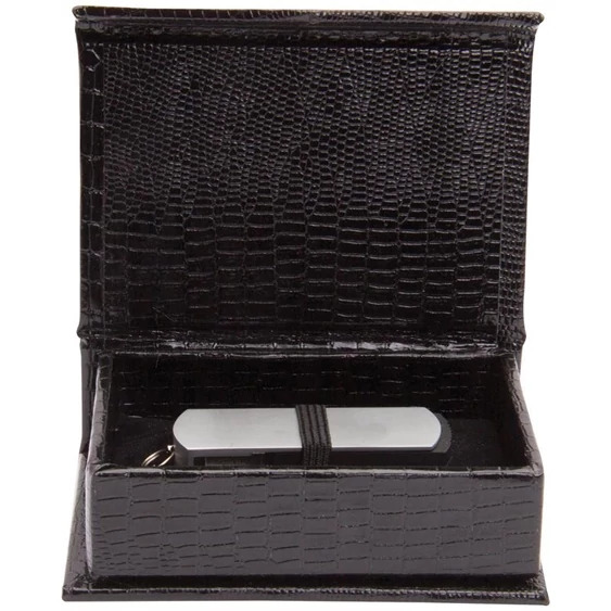 Tyndell Leatherette USB Box showing shiny black crocodile embossed exterior with magnetic closure flap for flash drive delivery