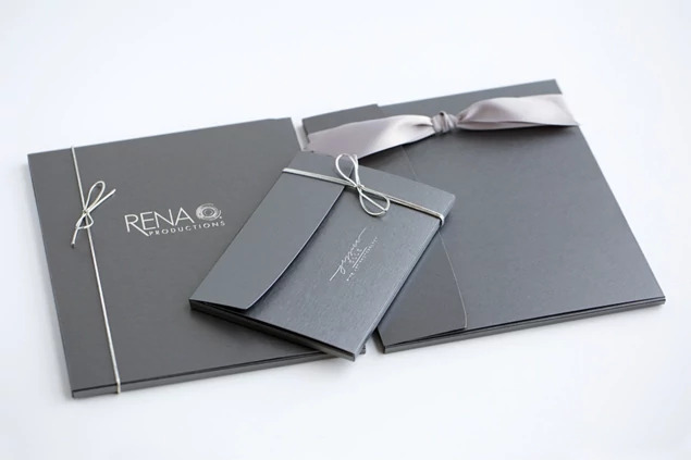 Steel Portrait Case open showing fold-out construction that holds up to 20 unmounted prints