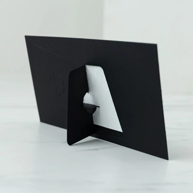 Tyndell Panoramic Easel close-up showing black foil stamped border and thick black board construction