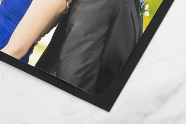 Black Mascot Folders stacked showing range of sizes for events proms and school dances
