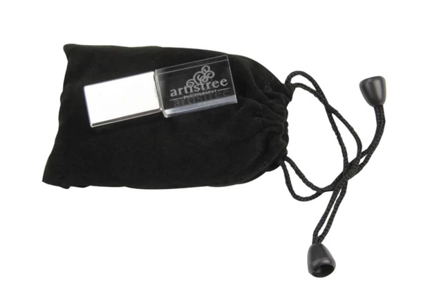 Black velvet drawstring USB bag shown open displaying interior for flash drive storage