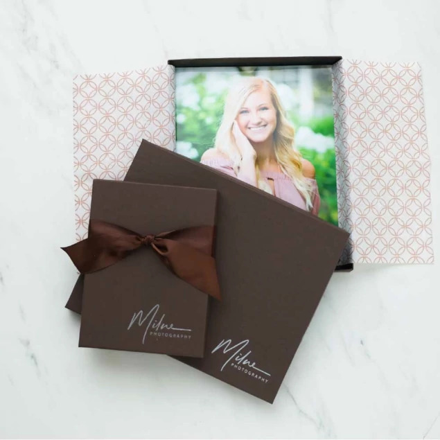 Matte chocolate portrait box open displaying senior portrait print with tissue paper lining     Tyndell portrait box