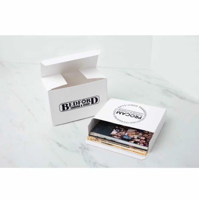 White Tyndell Photo Proof Box flat packed showing space-saving storage and shipping design
