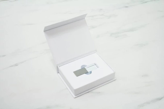 White Magnetic USB Gift Box open showing foam insert detail and full color printed lid branding