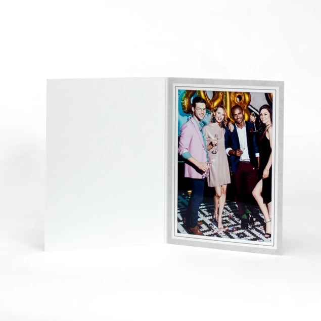 Gray PF-20 5x7 event photo folder open with family portrait inside, black border, printed coated gray board