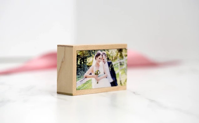 Tyndell Maple Wood USB Slide Box with full color printed studio logo showing customization on maple lid
