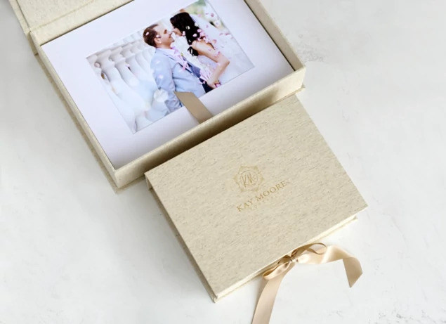 Tyndell Portfolio Box in Linen open showing interior mat-holding capacity and ribbon tie closure detail