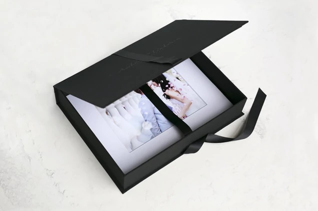 Tyndell Portfolio Box in Black showing laser engraved studio name customization on fabric cover
