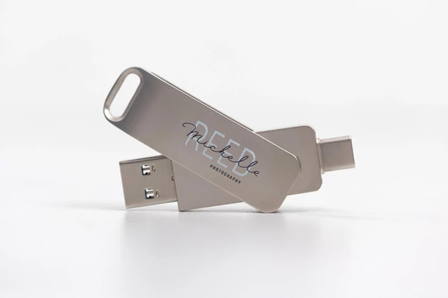 Silver aluminum dual metal flash drive showing both USB-A 3.0 and USB-C swivel connectors