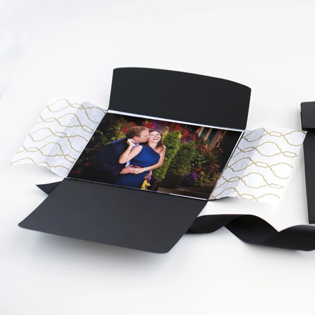 Black Soft Touch Portrait Case open showing fold-out construction that holds up to 20 unmounted prints
