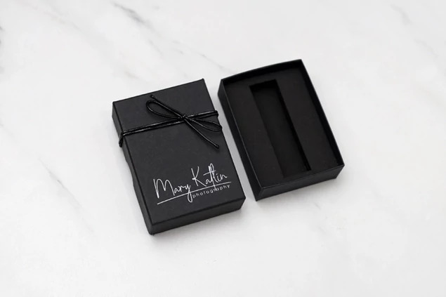 Tyndell USB Kit open showing foam insert interior and portrait wallet box construction