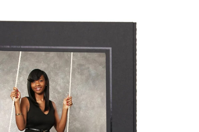 Print Folder with studio die foil imprinting showing custom branding on black recycled paper folder