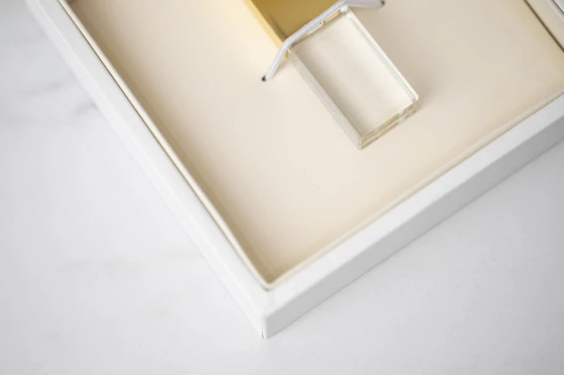 Tyndell White Soft Touch USB Box open showing ivory suede lining with elastic band for flash drive