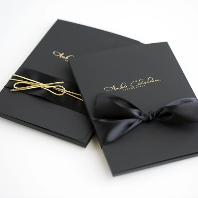 Black Soft Touch Portrait Cases in 5x7, 8x10, and 11x14 showing soft touch finish with subtle texture and rounded edges