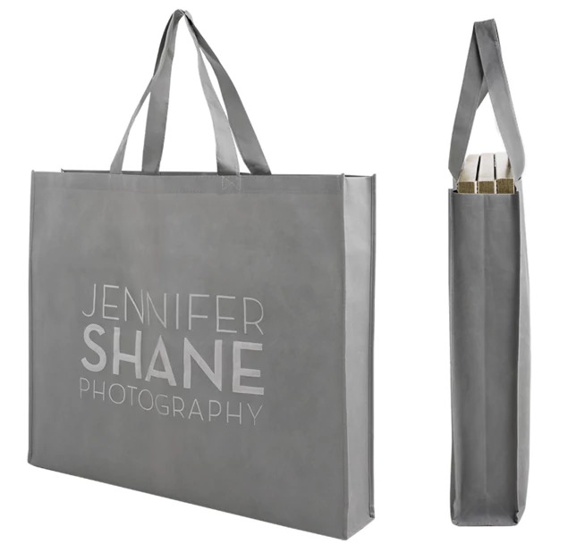 Slate gray frame bags in multiple sizes shown together for large framed portrait and canvas wrap delivery