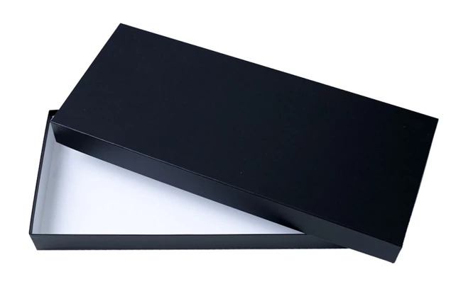Black panoramic box with textured cover and white interior open at an angle     Tyndell 8x20 panoramic print packaging