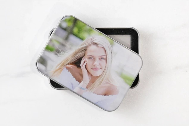 Credit card flash drive and metal tin bundle closed showing branded aluminum tin and credit card USB